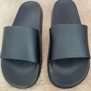 Black slides women’s size 11, men’s size 9.5
